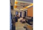 Buy an apartment in a deluxe housing project in Noida.
